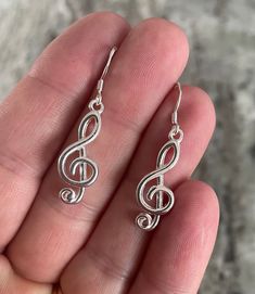 The Table Clef is 1 inch in length. Music note, Ear Wire and Lever back is 925 Sterling Silver. Silver Nickel-free Music-themed Earrings, Nickel-free Music-themed Jewelry For Concerts, Music-themed Dangle Jewelry Gift, Music Note Earrings, Musician Gifts, Treble Clef, Music Note, Music Notes, Choir