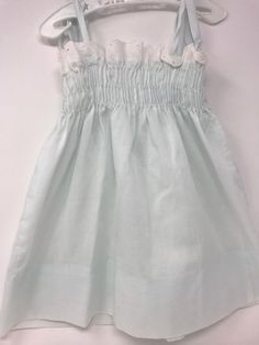 "Vintage pillowcase style dress/shoulder strings 13\" in length /dress length-top to bottom 13 1/2\" including eyelet trim with a 3\" hem available /Pitt to pit 8 1/2\" to 9\"/no issues very little stretches available through chest/smoke free environment/no issues other than age(137)" Fitted Smocked Dress With Lace Trim For Summer, Sleeveless Smocked Dress With Lace Trim For Spring, Cute Smocked Summer Dress, Cute Summer Smocked Dress With Smocked Back, Cute Summer Dress With Smocked Back, Lined Smocked Dress For Summer Daywear, Summer Smocked Dress With Lace Trim For Daywear, Summer Cotton Smocked Dress With Lace Trim, Summer Daywear Smocked Dress With Lace Trim