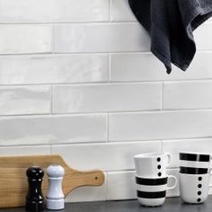 black and white kitchen accessories on the counter