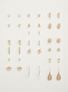 A set of on-trend earrings includes a mix of silver-tone and gold-tone designs that range from simple to pave. Set of 18. Post back. Base metals. Imported. The best plus size women's mix & match earring set - of 18 earrings sets in gold. Torrid is your destination for the freshest spring and summer styles. Trend Earrings, Trending Earrings, Multiple Earrings, Shine Jewelry, Preppy Jewelry, The Gold Rush, Accessories Ear, Earrings Sets, Packing Jewelry