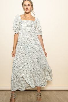 Expertly crafted with a ruching pleat detail bodice and a smocked back, the Alison Floral Maxi Dress offers both style and comfort. The square neck adds a touch of sophistication while the side pockets provide practicality. Its extra wide flare offers a flattering silhouette. 100% Polyester Flowy Smocked Dress With Bodice And Square Neck, Flowy Smocked Dress With Square Neck And Smocked Bodice, Spring Smock Dress With Square Neck, Flowy Smock Dress With Square Neck, Square Neck Smock Dress For Day Out, Casual Midi Dress With Fitted Bodice For Daywear, Smock Dress With Square Neck For Day Out, Casual Smocked Square Neck Dress, Casual Maxi Dress With Fitted Bodice And Square Neck