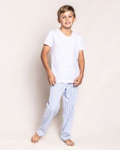 The sleepwear is made from the finest quality yarn-dyed cotton and blended with just enough inherently flame retardant fiber to allow it to pass strict CPSC flame retardant laws without using harmful chemicals. The fabric is brushed for added softness, making the sleepwear feel absolutely luxurious, getting cozier after each wash. In our luxurious sleepwear, your little one will be tucked in love and off to dreamland. Bonne nuit. Cotton Gingham Bottoms For Loungewear, Luxurious Sleepwear, Brand Direction, Light Blue Gingham, Tartan Pants, Luxury Sleepwear, Childrens Lighting, Boys Sleepwear, Kids Pjs