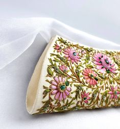 "Stunningly beautiful, opulent champagne colored silk clutch, expertly hand embroidered in silk and embellished with genuine jewels - star rubies, garnets, green onyx. This is a gorgeous wardrobe investment piece! Add instant glamour and elegance to any evening ensemble! Be bold and be noticed Exquisitely hand embroidered by master craftsmen in the historic city of Agra, India, home of the Taj Mahal. Embroidered front and back in the zardozi tradition, using metallic threads, silk and precious s Pink Embroidered Clutch Evening Bag, Embroidered Clutch For Wedding Guest, Elegant Pink Clutch With Handwork, Elegant Pink Embroidered Evening Bag, Traditional Pink Evening Bag For Formal Occasions, Elegant Pink Bags For Receptions, Elegant Pink Bags For Reception, Pink Pearl Embroidery Bags For Wedding, Elegant Embroidered Pink Clutch