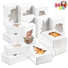 several white boxes with different designs and shapes on the inside one box has an image of a bear in it