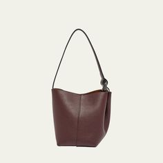 JW Anderson "Corner" bucket bag in grain calf leather  Shoulder strap with oversized chain-link hardware, 8.7" drop Open top with magnetic closure  Lining: Suede Approx. 7.9"H x 5.9"W x 5.5"D Made in Hungary Flat Pouch, Jw Anderson, Leather Bucket Bag, Leather Bucket, Open Top, Pouch Bag, Magnetic Closure, Hungary, Chain Link