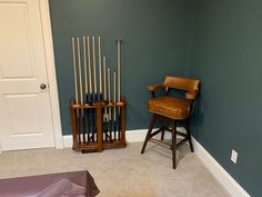 a chair sitting in the corner of a room