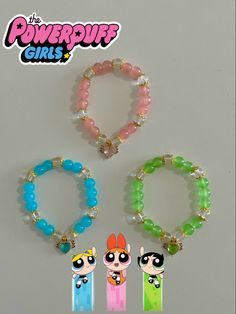 the powerpuff girls beaded bracelets are shown in three different colors and designs