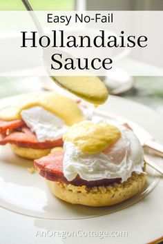 an egg and tomato sandwich on a plate with the words easy no - fail hollandaise sauce