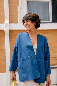 One size. Say hello to the perfect coat! Inspired by Japanese haori, french workwear, and our nana Diana. (Merna is our other grandma.) Easy to throw on with an open front. Giant double patch pockets hold your phone, wallet and keys. Cropped sleeves look great rolled up, and stay out of the way during hand washing, activities and chores. Easy to wear both inside and outside the house. Fabric is a soft, denim in Wrangler Blue - that perfect, medium indigo found in vintage 1970s Wrangler jeans. We Denim Kimono, Quilt Crafts, Minimal Life, Japanese Haori, French Workwear, Fashion Moodboard, Cropped Sleeves, Future Clothes, Ladies Wear