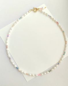 Dainty Pearl Beaded Necklaces For Summer, Summer Pearl White Necklaces With Round Beads, Summer Pearl Beaded Necklaces, Handmade Dainty Pearl Necklace For Summer, Summer Pearl Necklace With Tiny Beads For Gift, Dainty Pearl Necklace For Summer, Summer Pearl Necklaces With Tiny Beads, White Pearl Strand Beaded Necklaces, White Pearl Necklace Summer Gift