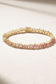 Suzanne Kalan's signature scattered setting is inspired by fireworks - this tennis bracelet captures the effect so beautifully with tonal-pink sapphires that fade to diamonds. It's handcrafted from 18-karat gold and looks especially chic with the coordinating necklace from the same collection. Gold Pink Earrings, Luxury Pink Diamond Bracelet, Elegant Pink Jewelry With Baguette Diamonds, Elegant Pink Baguette Diamond Jewelry, Elegant Pink Sapphire Baguette-cut Jewelry, Elegant Pink Sapphire Jewelry Baguette Cut, Pink Diamond Gemstone Bracelets, Luxury Pink Sapphire Bracelets, Pink Diamond Tennis Bracelet With Jubilee Design