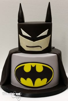 a batman cake is shown on a white table