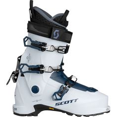 a pair of white ski boots with black and blue trims on the bottom part