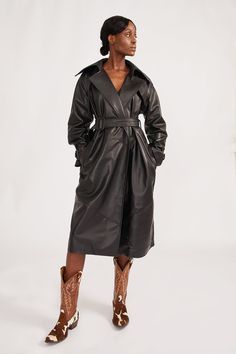 Our classic trench is slightly oversized and perfect for layering. 100% Lamb Leather Lining in 100% Polyester Made in Italy Professional leather cleaner only San Junipero, Black Trench Coat, Leather Cleaner, Leather Outerwear, Black Crane, Trench Coat Black, Leather Cleaning, Lifestyle Shop, Clothing Co