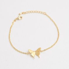 "These personalized butterfly bracelets will be perfect thank you gifts for your wedding, anniversaries, and birthdays. You can also gift these to your best friends, bridesmaids and sorority sisters! Great minimal bracelets for layering or for easy, everyday wear. D E T A I L S - Delicate Initial Butterfly charm - Butterfly Size: 13mm x 17 mm - Hand-Stamped Initial of your choice - We can stamp Uppercase letters, numbers,♡ (heart) - Available in Gold, Rhodium, or Rose gold Plated - This listing Dainty Silver Butterfly Bracelets, Elegant Butterfly Bracelets For Gifts, Gold Butterfly Jewelry For Wedding, Elegant Butterfly Bracelets For Gift, Silver Dainty Butterfly Bracelets, Dainty Butterfly Charm Jewelry For Wedding, Dainty Wedding Jewelry With Butterfly Charm, Elegant Hypoallergenic Butterfly Jewelry, Mother's Day Butterfly Jewelry With Butterfly Charm