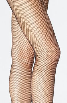 Fishnet Nylon Legwear, Fishnet Tights For Party, Party Fishnet Legwear In Mesh, Party Fishnet Mesh Legwear, Party Fishnet Legwear, Stretch Fishnet Bottoms For Spring, Party Legwear In Fishnet Mesh, Stretch Mesh Fishnet Tights, Black Fishnet Mesh Bottoms