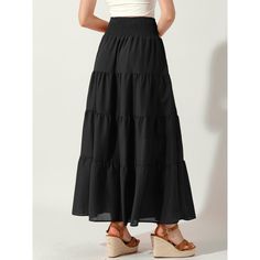 No matter what body type you are, this must-have skirt is a perfect choice for your summer and spring. Simple solid-colored design will never be out of date, the timeless maxi boho skirt is suitable for dates, school, travel, parties, beach, vacations, and daily casual. This is such a pretty skirt, with a lightweight fabric, swing, and flowy hem, easy to match with crop tops, boho tops, t-shirts, long-sleeve blouses, cardigans, and bikinis. Solid Color Summer Maxi Skirt, Summer Maxi Skirt With Elastic Waistband For Day Out, Casual Maxi Skirt With Elastic Waistband For Summer, Black Solid Color Beach Bottoms, Flowy Tiered Skirt In Solid Color, Non-stretch Maxi Skirt For Spring Vacation, Spring Vacation Maxi Skirt With Elastic Waistband, Black Non-stretch Maxi Skirt For Summer, Beach Season Skirt With Elastic Waistband