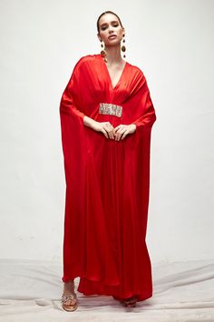 Buy Ranian Red Silk Pleated Kaftan Online | Aza Fashions Bollywood Style V-neck Party Kaftan, Elegant Silk Floor-length Kaftan For Evening, Evening Silk Embellished Kaftan, Evening Embellished Silk Kaftan, Bollywood Style Long Sleeve Evening Kaftan, Bollywood Style Evening Kaftan With Long Sleeves, Traditional V-neck Evening Kaftan, Elegant Red V-neck Kaftan, Bollywood Style Silk Evening Kaftan