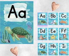 an animal alphabet game with sea animals and letters on the board, including a turtle