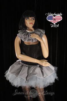 a mannequin wearing a black and white dress with an american flag on it