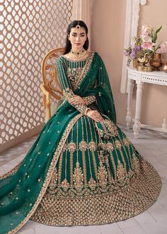 Bottle Green Bridal Lehenga Choli and Dupatta Dress is a traditional masterpiece that gives you a head-turning appearance on the most important day of your life. Hand-crafted details of motifs, sequins, zardosi, and floral details give an exquisite look to this beautiful Lehenga Dress. Choli: The beautifully embellished choli in an alluring bottle green shade is a stunning choice to pair with Lehenga. The choli comes in raw silk fabric. Floral designs, motifs, zardosi, sequins, and stones give a Green Bridal Lehenga, Lehenga Choli For Wedding, Blue Lehenga Choli, Choli For Wedding, Pakistani Bridal Lehenga, Pakistani Bridal Dress, Cutwork Blouse, Green Wedding Dresses, Chanakya Quotes