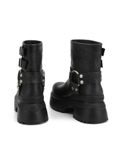 Product Description Eclipse our new tiny little ankle boot. This boot is designed with a multiple buckle strap upper detail, Western ring harness, Branded studs, Stone wash/suede leather duo. Features New buckle feature Stone wash leather Full leather sock Metal buckles Super soft outsole TPU branded insert 7.5cm sole height Gothic Moto Boots Ankle Boot With Rivets, Punk Style Ankle Boots With Buckle Closure, Gothic Leather Boots With Grommets, Gothic Studded Leather Boots, Gothic Leather Boots With Studs, Gothic Leather Moto Boots With Studded Outsoles, Edgy Ankle-high Moto Boots With Rivets, Punk Ankle-high Moto Boots With Buckle Closure, Punk Ankle-high Moto Boots With Buckle