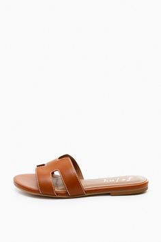 Cognac Leather Alibi Sandals | French Sole Classic Slip-on Slides For Summer, Classic Flat Sandals With Rubber Sole, Classic Flat Mules With Textured Footbed, Spring Leather Slides With Stitched Sole, Leather Slides With Stitched Sole For Spring, Classic Slide Sandals For Vacation, Classic Sandals With Flat Heel And Rubber Sole, Classic Beach Slides With Rubber Sole, Classic Leather Slides For Spring