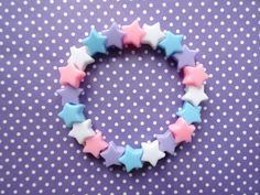 ☆This cute little bracelet is made of pastel star beads. Made to fit up to a 7 inch wrist.  If you have any questions please message me!☆ Kidcore Kandi, Pastel Stars, Kawaii Bracelet, Pastel Accessories, Bracelets Bead, Kawaii Fairy, Diy Kandi Bracelets, Pastel Jewelry, Bracelet Beading