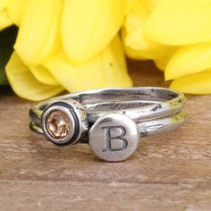 "This set of two stackable rings can represent the initial and birthstone of your child or any loved one. This also makes a great gift for graduation or a birthday. Or, wear your own birthstone and initial! Add to this ring over time by stacking more bands. Give the gift of this perfect mother's or grandmother's stacking ring set! Need more than 2 rings in your set? Create your own stack here: https://www.etsy.com/listing/230740149 These rings are also available in GOLD: https://www.etsy.com/lis Adjustable Sterling Silver Stackable Rings, May Birthstone, Adjustable Sterling Silver Stackable Rings For May Birthstone, Adjustable Stackable Sterling Silver Birthstone Ring, Adjustable Stackable Birthstone Ring For Promise, Adjustable Stackable Birthstone Promise Ring, Adjustable Stackable Initial Ring, Customizable Silver Birthstone Ring, Customizable Adjustable Silver Birthstone Ring, Birthday Adjustable Stackable Sterling Silver Rings