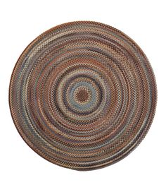 a brown and blue rug on a white background