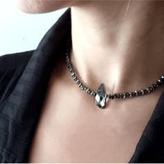 Hi there, thank you for your interest in our hematite black ( dark gray) pendant necklace, Black (dark grey) choker necklace, and black (dark grey) crystal pendant necklace., which are known for their beautiful luster and durability. Our black ( dark grey) crystal pendant necklaces feature a beautiful black (dark grey) crystal pendant, making it the perfect addition to any outfit.  Size: 36.5 cm / 14.37 inches Features: ❤ Hematite  stones, Silver 925, crystal pendant ❤ Handmade item ❤ All my jew Black Crystal Necklace, Ocean Earrings, Long Pearl Earrings, Black Earrings Dangle, Hematite Necklace, Crystal Pendant Necklace, Purple Earrings, Purple Rhinestone, Necklace Crystal