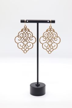 Gold Filigree Dangling Earrings are intricately designed, featuring delicate gold filigree work that creates an elegant, lace-like pattern. They hang gracefully, offering a touch of sophistication and timeless beauty, perfect for adding a refined statement to any outfit. Beautiful Gold Earrings, Gold Filigree, Dangling Earrings, Christmas Sale, Timeless Beauty, Rainbow Colors, Gold Earrings, Dangle Earrings, Gemstones