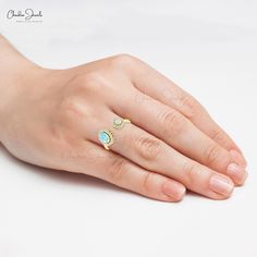 Description Elevate your style with our Solid 14k Gold Adjustable Split Shank Ring. Featuring a stunning prong-set opal and a 1.5mm halo diamond, this fine ring combines elegance and versatility. Perfect as a gift or a personal treat, it's a timeless piece for any jewelry collection. Product Details SKU CJ R 1828 OP Product dimension - Metal 14K Solid Gold Birthstone October Opal Details 1 Size 7x5mm Quality AAA Pieces 1 Weight 0.72carats Setting Prong Enhancement None Opal Details 2 Size 4mm Qu Fine Jewelry Opal Ring With Halo Setting As Gift, Cabochon Opal Ring With Diamond, Turquoise Cabochon Opal Ring For Gift, 14k Gold Opal Cabochon Ring, Blue Opal Ring For Gift, Fine Jewelry Style, Split Shank Ring, Fine Ring, Split Shank, Opal Rings