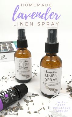 two bottles of lavender linen spray sitting on top of a table