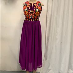 100% Authentic Mexican Shirt This Shirt Is Gorgeous. Color:Purple Size:S Materila"Manta Please Check Measurements To Make Sure Is The Size You Need. Chest: 20” Waist: 15.5” Sholder:12” Sholder To Hem:50.5” This Dress Can Fit Up To Medium Ebroidery Mexican Dress Folk Fabric Flowers Mexican Tunic Traditional Embroidery This Shirt Is Perfect For Any Occasion This Shirt Is Meant To Provide Extreme Comfort Throughout The Day The Perfect Gift For Her Festive Embroidered Purple Dress, Purple Embroidered Bohemian Dress, Purple Embroidered Dress For Summer, Purple Maxi Dress With Resham Embroidery, Festive Bohemian Purple Dress, Embroidered Purple Maxi Dress, Purple Embroidered Maxi Length Dress, Traditional Purple Summer Dress, Spring Purple Embroidered Dress