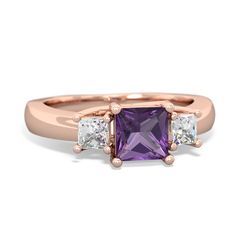 This 14K Rose Gold trellis three stone ring features a Princess deep purple amethyst, flanked by .40 carats of diamonds. A trellis ring features gorgeous interwoven prongs holding the amethysts that symbolize the union of marriage and the wonderful journey you two will embark on together for the rest of your lives. Trellis Ring, British Crown Jewels, Three Stone Ring, Amethyst Jewelry, Solitaire Pendant, The Union, Three Stone Rings, Amethyst Ring, White Topaz