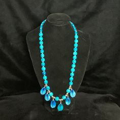 Beautiful turquoise beads coupled with matching turquoise seashells.  Measures 24" long. Turquoise Necklace With Large Beads For Beach, Turquoise Shell Beaded Necklaces, Turquoise Shell Beaded Necklaces With Round Beads, Turquoise Beaded Shell Jewelry, Bohemian Blue Shell Beaded Necklaces, Blue Bohemian Shell Beaded Necklaces, Turquoise Shell Round Bead Jewelry, Blue Shell Jewelry With Colorful Beads, Turquoise Shell Necklace With Round Beads