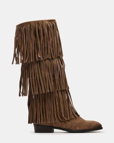 Upgrade your wardrobe with the SPUR fringe boot. These boots feature a fringe detailing that adds a touch of effortless style. Perfect for any occasion, these boots will elevate your look while providing comfort and durability. 1 inch heel height 14.5 inch shaft circumference 15 inch shaft height Suede upper material Synthetic lining Leather sock Synthetic sole Fit tip: If you are in between sizes, size up a half-size Imported Fringe Suede Boots, Brown Fringe Boots Outfit, Fringe Boots Outfit, Brown Fringe Boots, Fringed Boots, Black Fringe Boots, Suede Fringe Boots, Fringe Shoes, Alex Russo