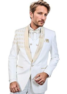 Elevate your style and immerse yourself in the pinnacle of luxury with our handcrafted Off-White Hand-Embroidered Tuxedo Set, an exclusive offering designed specifically for discerning men who possess a deep appreciation for life's finer pleasures. The tuxedo jacket stands as a masterpiece of sartorial artistry, boasting intricate embroidery that pays homage to the exceptional skill of our artisans. Every detail has been meticulously hand-stitched to perfection, reflecting a level of craftsmanship that transcends ordinary attire. The rich Off-White fabric exudes an aura of sophistication and elegance, making it the ideal choice for any formal occasion. The ensemble comprises a classic tuxedo jacket, impeccably tailored pants, a coordinating vest, a refined bow tie, and a crisp white shirt. Luxury White Blazer For Wedding, Luxury White Wedding Blazer, Designer Wedding Suits With Notch Lapel, Luxury White Tuxedo For Wedding, Elegant White Groom's Sets, White Notch Lapel Wedding Sets, White Notch Lapel Sets For Wedding, Luxury White Wedding Tuxedo, Elegant White Sets For Groom