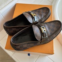 Louis Vuitton Major Loafers. Pre-Owned Loafers In Great Condition. Worn A Handful Of Times. Well Kept. Shoes Come With Box. Size 9.5 Pls Know Your Lv Size. 100% Authentic. Feel Free To Ask Any Question. Note: Shoes Have Been Worn And They Are Not Brand New. There Are Signs Or Use But No Major Signs Of Wear Designer Brown Slip-on Loafers, Designer Brown Loafers With Branded Heel, Shoes Louis Vuitton, Louis Vuitton Shoes, Loafer Shoes, Men's Shoes, Loafers, Louis Vuitton, Slip On