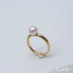 With a delicate classic design of solid gold and pearl, complete your jewelry box with a piece of real fine jewelry but affordable price. Hand picked flawless 7-7.5mm premier round Akoya cultured pearl with gorgeous hues. We only use the best Akoya for fine jewelry series. Available in solid 14K white, yellow and rose gold. - 7-7.5mm Premier Akoya Cultured Pearl- Solid 18K Gold Available in Rose, Yellow or White*Please note:This is a Made To Order ring, and will be handcrafted to order and ship Formal Minimalist Pearl Ring With Polished Finish, Minimalist Formal Pearl Drop Ring, Timeless Akoya Pearl Ring For Formal Occasions, Classic Gold Pearl Ring With High Luster, Classic Round Pearl Ring With Pearl Drop, Classic Gold Pearl Ring With Polished Finish, Timeless Gold Pearl Ring, Classic Pearl Ring With Pearl Drop, Minimalist Polished Pearl Ring For Formal Occasions