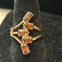 I Love This Dainty Ring! It’s Dainty And Pretty Yet Has A Pop Of Warm Brown Amber Topaz. It Is The Only Ring Of This Kind We Have Found In Some Vintage Inventory We Just Unpacked. It Is A Size 6. Stamped 18k Gold Filled Jewelry Pouch Size 6 Only Orange Topaz Ring, Formal Gold Topaz Ring With Gemstone Accents, Formal Topaz Crystal Ring With Prong Setting, Gold Multi-stone Topaz Ring For Formal Occasions, Gold Topaz Multi-stone Ring, Gold Multi-stone Topaz Ring, Gold Topaz Crystal Ring With Prong Setting, Gold Multi-stone Birthstone Ring, Yellow Gold Topaz Crystal Ring For Anniversary