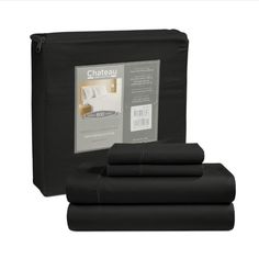 the black sheet set is next to it's packaging