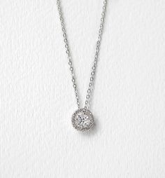 PRODUCT DETAILS: - White Gold over Sterling Silver - Cubic Zirconia Crystals (Best Quality!) - Hypoallergenic posts for sensitive ears - Pendant Diameter 3/8 in, Chain L 16 in + 2 in ext - Earrings 3/ Classic Solitaire Necklace With Halo In Cubic Zirconia, Cubic Zirconia Solitaire Necklace With Halo For Gift, Cubic Zirconia Solitaire Halo Necklace Gift, Sterling Silver Square Pendant Solitaire Necklace For Wedding, Classic Solitaire Cubic Zirconia Necklace With Halo, Elegant Sterling Silver Rhinestone Necklace With Sparkling Stones, Wedding Solitaire Square Pendant Necklace In Sterling Silver, Elegant Solitaire Necklace With Square Pendant For Formal Occasions, Elegant Square Pendant Solitaire Necklace For Formal Occasions