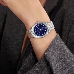 The classic and elegant Timeless Classic watch, the dial is made of deep blue and unique shining luster of blue sandstone, creating a mysterious and romantic starry sky on the wrist; the stainless steel case is paired with charming diamonds, echoing the starry dial, showing a unique fashion taste. Case: 31mm and 36mm steel case with polished and satin finish Waterproofness:10ATM Swimming is allowed, but only for shallow swimming (Do not operate the watch handle head in water or when the watch is Timeless Blue Diamond Watch, Elegant Blue Diamond Watch, Elegant Blue Diamond Watch With Round Dial, Elegant Blue Watches For Gifts, Blue Timeless Diamond Watch, Luxury Blue Watches For Evening, Luxury Blue Evening Watch, Elegant Blue Watch With Metal Dial, Head In Water