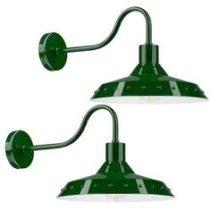 two green wall lights with one light on each side and the other off to the side