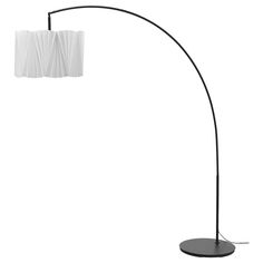 a black and white floor lamp with two lamps on each side, one light is turned on