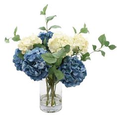 a vase filled with blue and white flowers