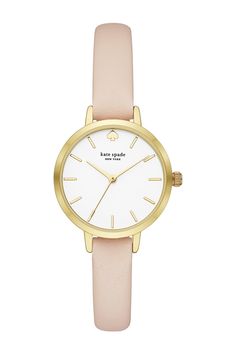 A slender leather strap contrasts a wide round, gold-tone case on this sophisticated and minimalistic watch. Style #: KSW9003. Gender: Women's. Case Material: Stainless steel. Dial Color: White. Band Material: Leather. Closure: Buckle. Case Diameter: 30mm. Case Depth: 8mm. Band Width: 10mm. Movement: Quartz. Water Resistance: 3ATM. Imported Trendy Watches With Leather Strap, Trendy Watches With Leather Strap And Round Dial, Chic Gold Everyday Watch, Chic Everyday Gold Watches, Trendy Everyday Watches, Everyday Gold Leather Watch, Gold Leather Everyday Watch, Everyday Gold Watches With Leather Strap, Minimalist Gold Leather Watch