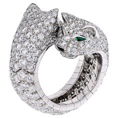 Cartier Panthere Ring, with double Lakarda diamond panthers facing each other. The Panthere de Cartier ring, made in 18K white gold, set with 356 brilliant-cut diamonds, totaling 5.04cts. Eyes and nose: emeralds, onyx. Serial 9387**. With a Cartier certificate. Size 5.75 Cartier Panther Ring, Panther Ring, Cartier Panthere, Fancy Jewellery Designs, Head Ring, Double Diamond, White Gold Set, Pave Diamond Ring, Cartier Ring